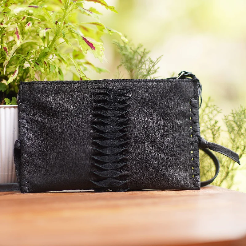 Hand-Cut Leather Sling Bag from Bali - Dark Center